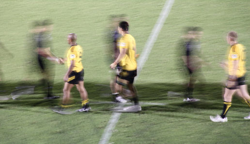George Gregan: The Suntory Sungoliaths (yellow) shake hands with their opponents (the Ricoh Black Rams)